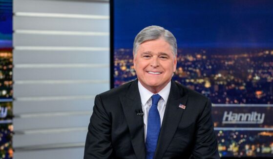 Host Sean Hannity poses as Vice President J.D. Vance visits the show "Hannity" at Fox News Channel Studios on June 15, 2026, in New York City.