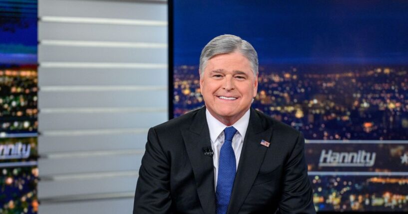 Host Sean Hannity poses as Vice President J.D. Vance visits the show "Hannity" at Fox News Channel Studios on June 15, 2026, in New York City.