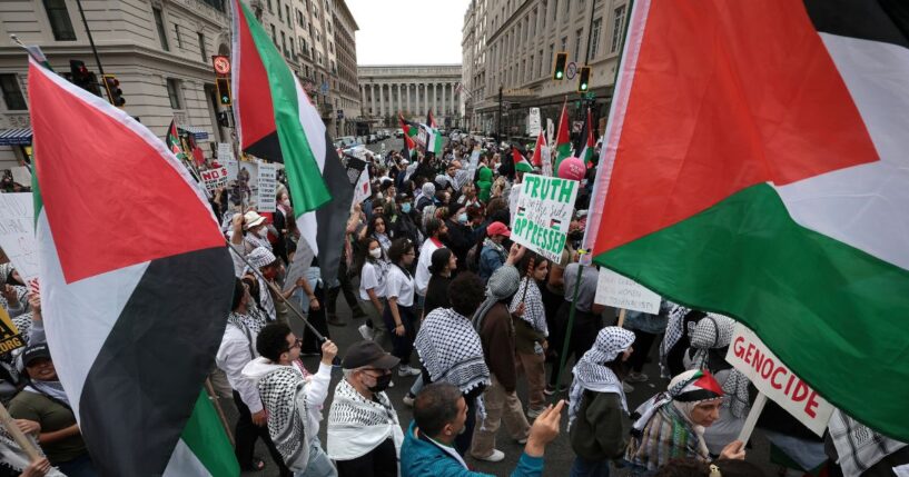 Protesters march from Freedom Plaza during the National March on Washington for Palestine while calling for a ceasefire between Israel and Hamas on Nov. 4, 2023, in Washington, D.C.