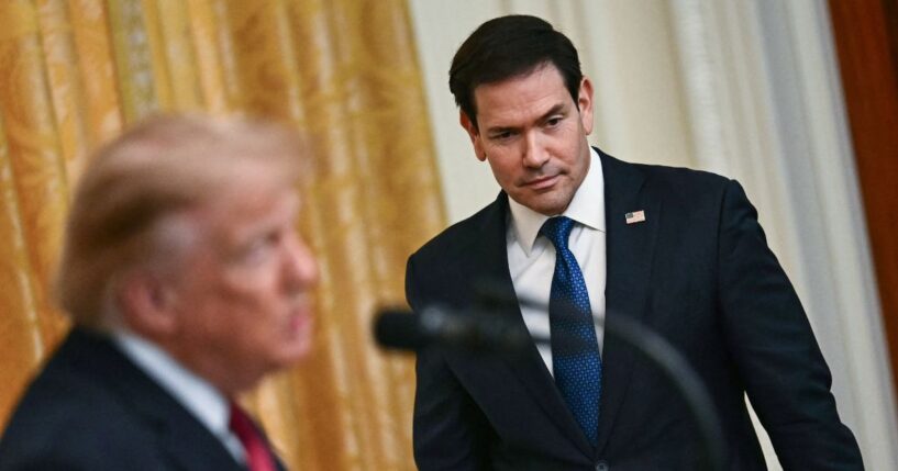 President Donald Trump speaks as Secretary of State Marco Rubio looks on during an event celebrating Hispanic Heritage Month in the East Room of the White House in Washington, D.C., on Sept. 30, 2026.