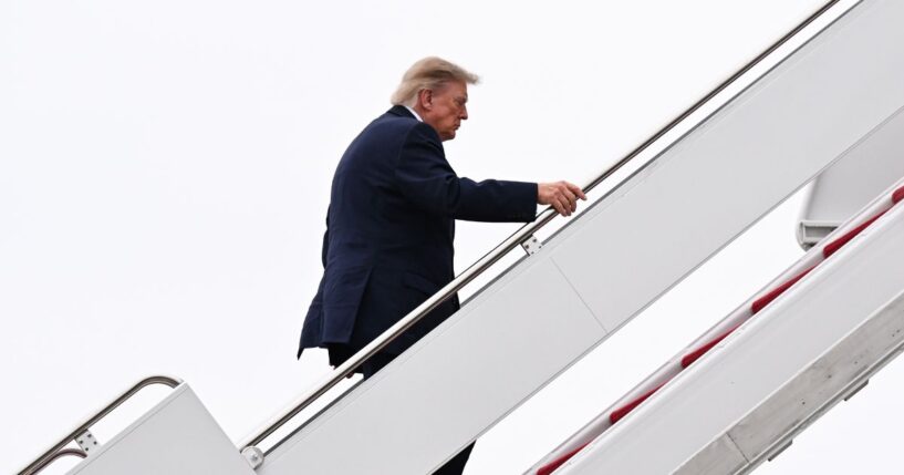 President Donald Trump boards Air Force One on Oct. 3, 2026, at Joint Base Andrews, Maryland.