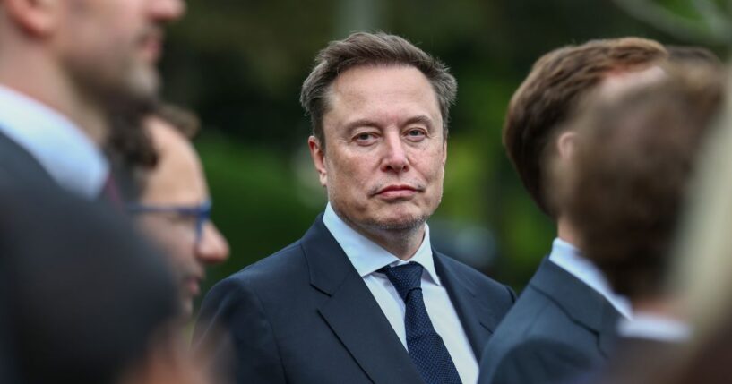 Tesla, SpaceX, and X CEO Elon Musk attends a press briefing held by President Donald Trump with AI executives following a meeting on artificial intelligence, outside the West Wing of the White House on Sept. 29, 2026, in Washington, D.C.