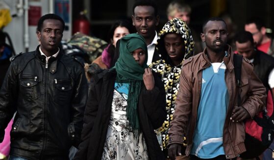 A group of migrants from Somalia that survived from an accident in the Aegean Sea last week arrive at the port of Piraeus in Athens on May 12, 2014.