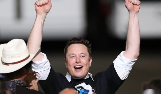 SpaceX founder Elon Musk celebrates after the successful launch of the SpaceX Falcon 9 rocket with the manned Crew Dragon spacecraft at the Kennedy Space Center on May 30, 2020, in Cape Canaveral, Florida.