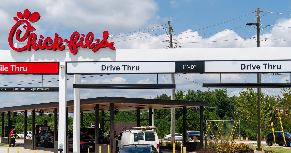 Cars are seen in the order lines on opening day at the first elevated Chik-Fil-A on Aug. 22, 2024, in McDonough, Georgia.