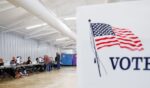 Voters check in on the second day of early voting ahead of the midterm elections, at a polling place at DuPage Event Center and Fairgrounds in Wheaton, Illinois, on Sept. 25, 2026.