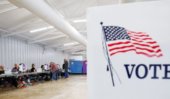 Voters check in on the second day of early voting ahead of the midterm elections, at a polling place at DuPage Event Center and Fairgrounds in Wheaton, Illinois, on Sept. 25, 2026.