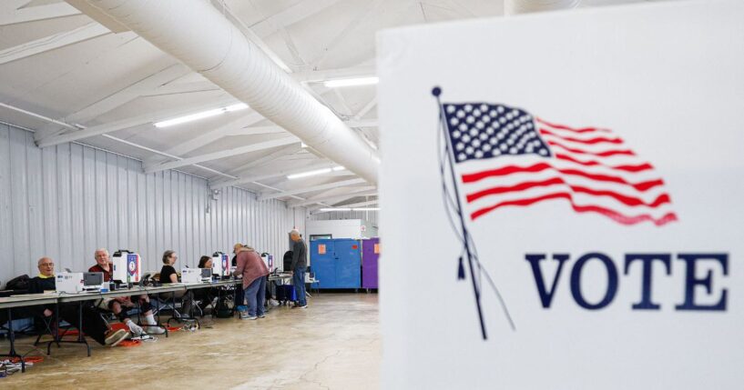 Voters check in on the second day of early voting ahead of the midterm elections, at a polling place at DuPage Event Center and Fairgrounds in Wheaton, Illinois, on Sept. 25, 2026.