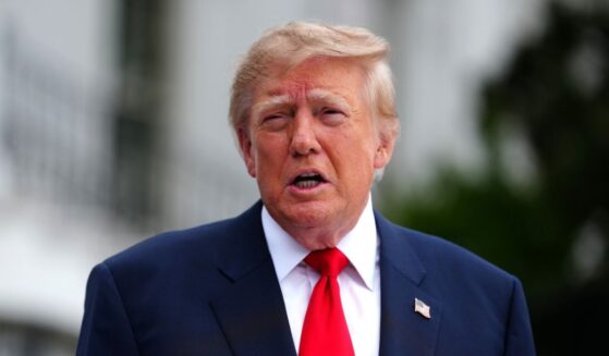 President Donald Trump speaks to members of the media as he departs the White House on the South Lawn on Oct. 10, 2026, in Washington, D.C.