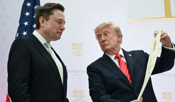 President Donald Trump presents the National Medal of Science to Elon Musk during the "Golden Age of American Innovation Summit" at the Institute of Peace in Washington, D.C., on Oct. 8, 2026.