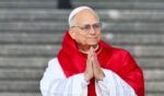 Pope Leo XIV gestures during a visit at the Maqam Echahid Martyrs' Monument in El Madania, near Algiers, on April 13, 2026.