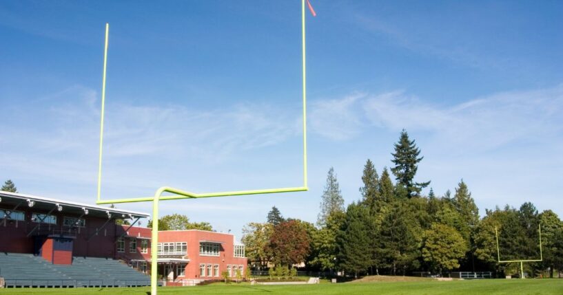 A high school football field.