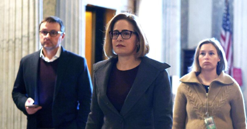 Sen. Kyrsten Sinema arrives at the Senate chamber for a live quorum call at the U.S. Capitol on Feb. 12, 2024, in Washington, D.C.