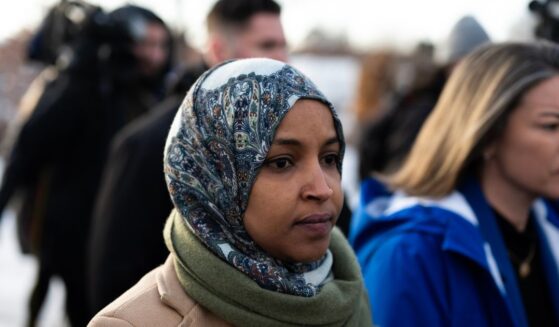 Rep. Ilhan Omar and Rep. Angie Craig arrive outside of the regional ICE headquarters at the Bishop Henry Whipple Federal Building on Jan. 10, 2026, in Minneapolis, Minnesota.