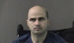 In this photo released by the Bell County Sheriff's Office, U.S. Maj. Nidal Hasan, the Army psychiatrist who is charged with murder in the Fort Hood shootings, is seen in a booking photo after being moved to the Bell County Jail on April 9, 2010, in Belton, Texas.
