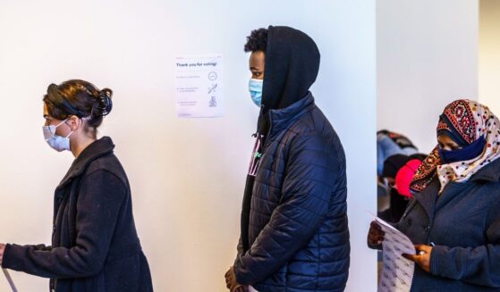 Residents vote at a polling station in Minneapolis, Minnesota, on Nov. 3, 2020.