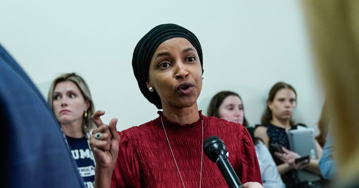 Rep. Ilhan Omar speaks to reporters in the hallway outside a House Committee on Education and the Workforce hearing "Columbia in Crisis: Columbia University's Response to Anti-Semitism" at Capitol Hill in Washington, D.C., on April 17, 2024.