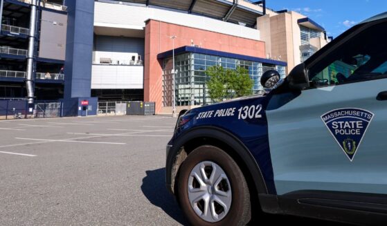 A general exterior view of Boston Stadium as a Massachusetts State Police car is seen ahead of the FIFA World Cup 2026 Group C match between Haiti and Scotland at Boston Stadium on June 13, 2026, in Foxborough, United States.