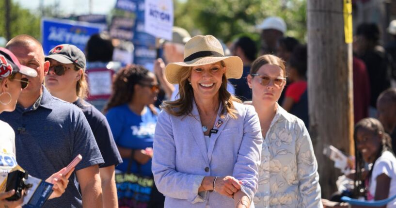 Amy Acton, the Democratic gubernatorial candidate for Ohio, greets constituents along the parade route of the 54th Annual CDC Parade on Sept. 7, 2026, in Cleveland, Ohio.