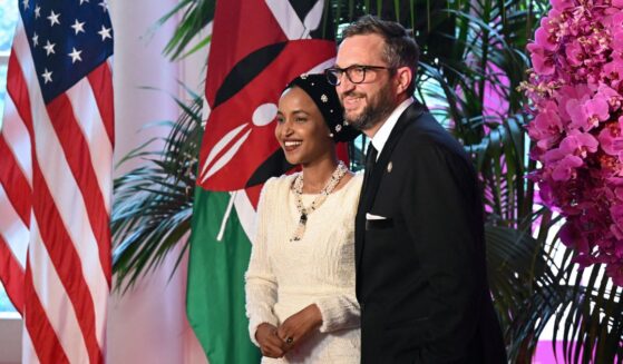 Rep. Ilhan Omar and Tim Mynett arrive at the Booksellers Room of the White House on the occasion of the State Dinner with the Kenyan president at the White House in Washington, D.C., on May 23, 2024.