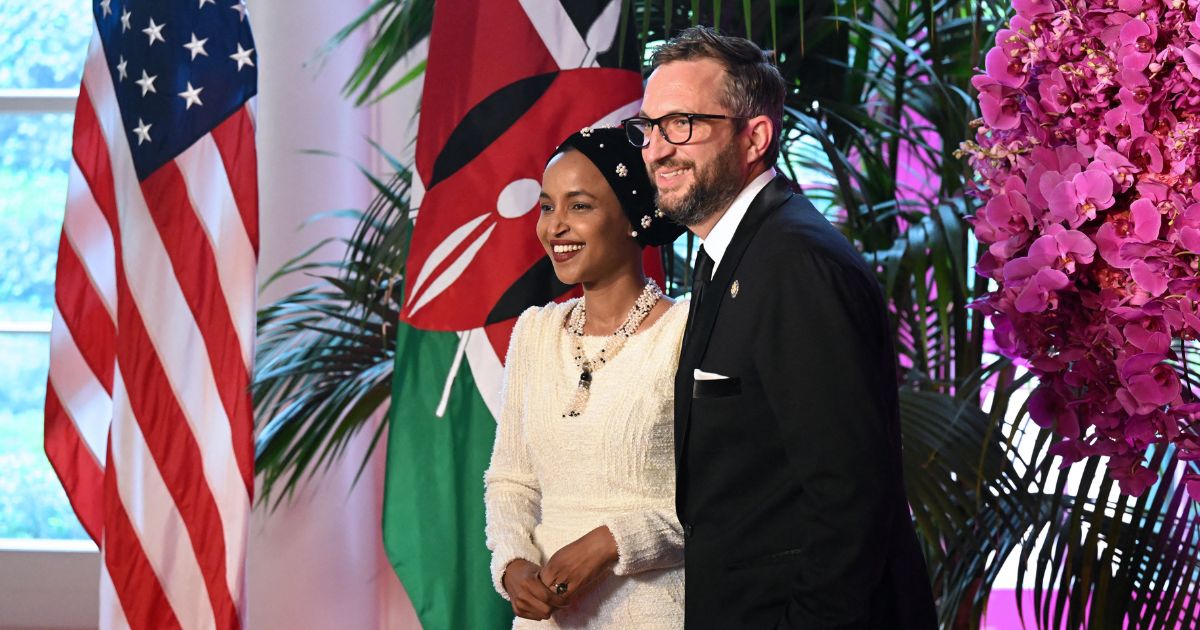 Rep. Ilhan Omar and Tim Mynett arrive at the Booksellers Room of the White House on the occasion of the State Dinner with the Kenyan president at the White House in Washington, D.C., on May 23, 2024.