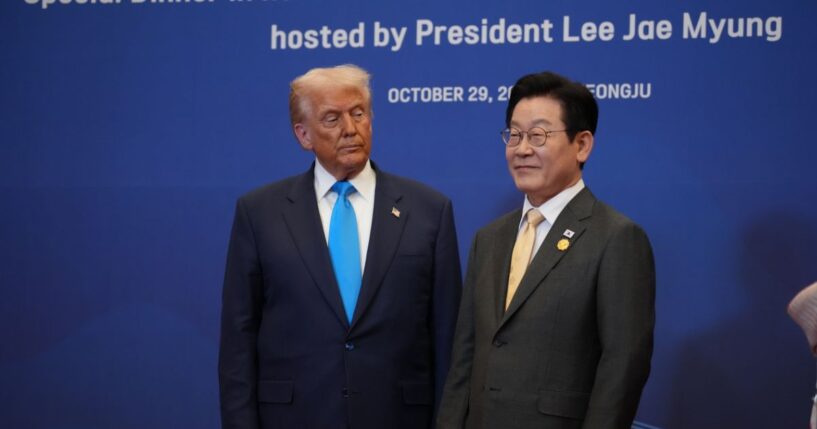 President Donald Trump stands next to South Korean President Lee Jae Myung ahead of a dinner at the Hilton Gyeongju on Oct. 29, 2025, in Gyeongju, South Korea.
