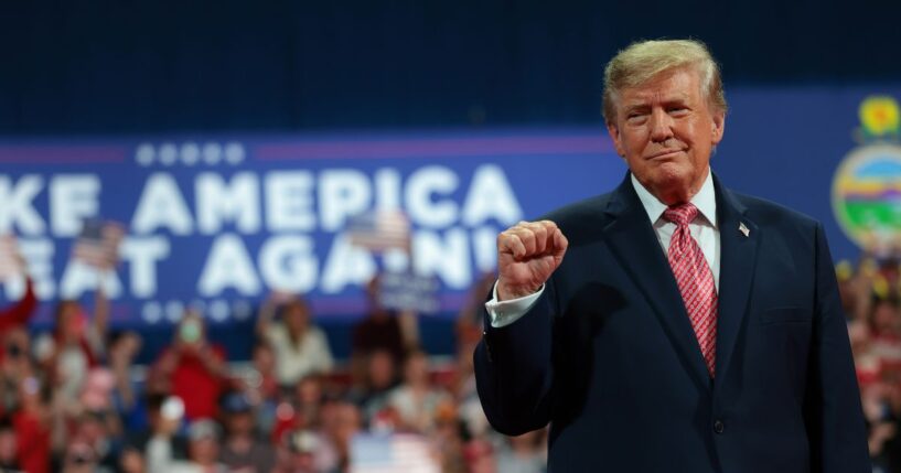 President Donald Trump greets supporters during a campaign rally at Heartland Credit Union Arena on Oct. 19, 2026, in Park City, Kansas.
