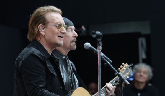 Bono performs during the dedication ceremony for the opening of the Barack Obama Presidential Center in John Lewis Plaza on June 18, 2026, in Chicago, Illinois.