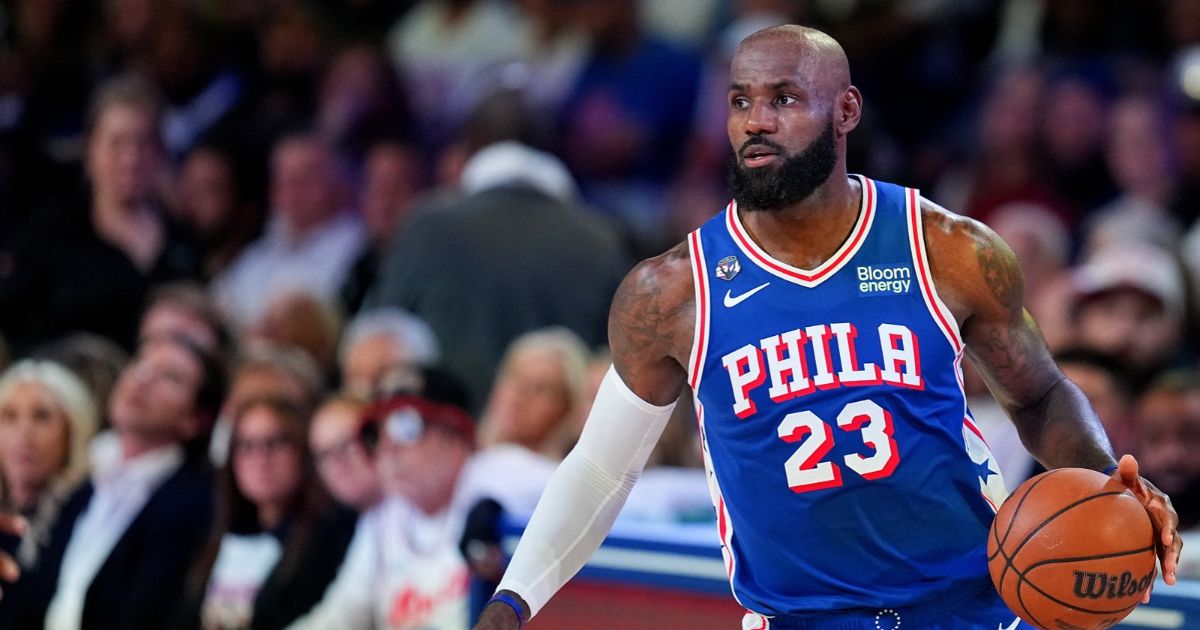 LeBron James of the Philadelphia 76ers looks on during the second quarter against the Cleveland Cavaliers at Xfinity Mobile Arena on Oct. 22, 2026, in Philadelphia, Pennsylvania.
