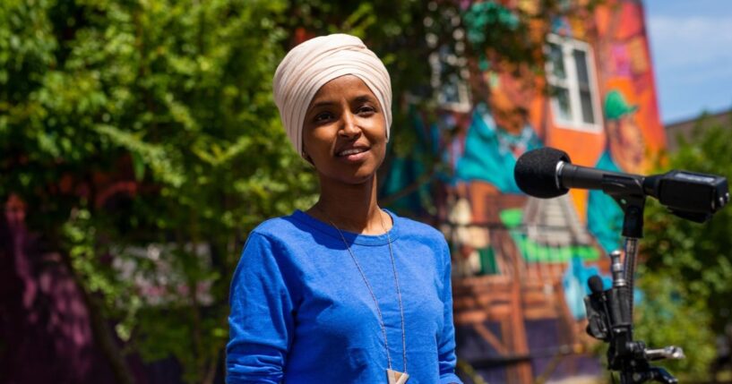 Rep. Ilhan Omar speaks with media gathered outside Mercado Central on Aug. 11, 2020, in Minneapolis, Minnesota.
