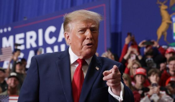 President Donald Trump arrives on stage to deliver remarks during an election rally at McMorran Place Sports & Entertainment Center on Oct. 25, 2026, in Port Huron, Michigan.