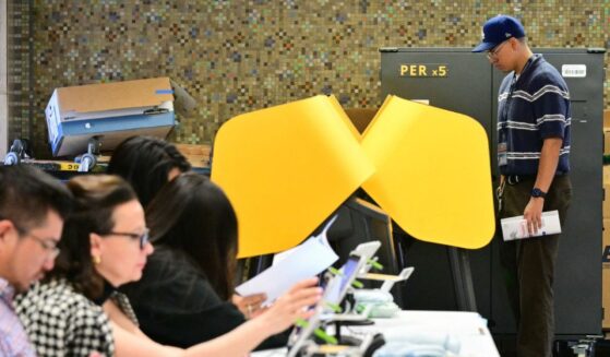A man votes at a polling place at the Kenneth Hahn Hall of Administration during California's state primary election in Los Angeles, California, on June 2, 2026.