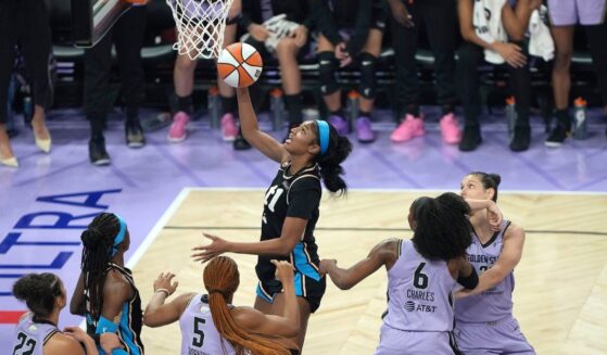 Angel Reese of the Atlanta Dream shoots over Kayla Thornton of the Golden State Valkyries during the second quarter in game five of the WNBA Finals at Chase Center on Oct. 26, 2026, in San Francisco, California.
