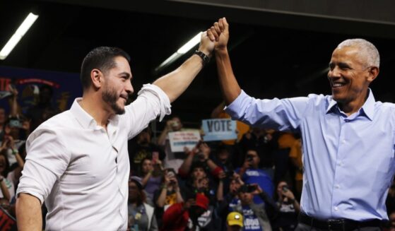 Former President Barack Obama stands with Democratic candidate for Senate, Abdul El-Sayed, during a “Get Out the Vote" rally on Oct. 24, 2026, in Detroit, Michigan.
