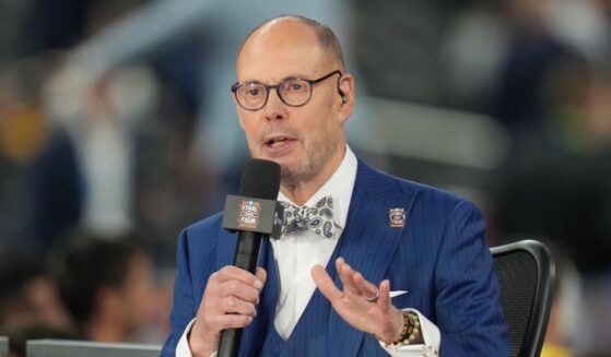 TNT college basketball analyst Ernie Johnson on air before the National Championship of the 2026 NCAA Men's Basketball Tournament between the Michigan Wolverines and the Connecticut Huskies at Lucas Oil Stadium on April 6, 2026, in Indianapolis, Indiana.