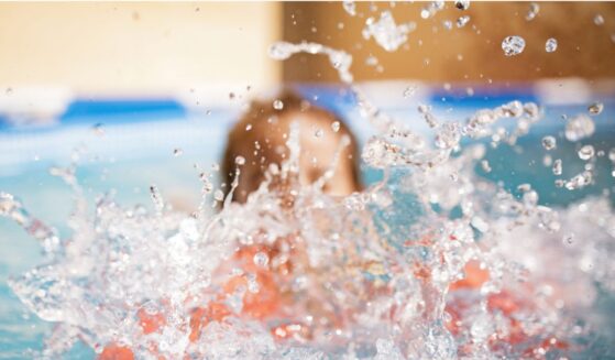 Surveillance video showed the boy swimming toward the center of the pool before abruptly "turning in circles and splashing vigorously.”