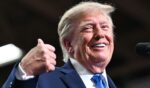 President Donald Trump speaks on stage at a campaign rally Saturday in Vandalia, Ohio.