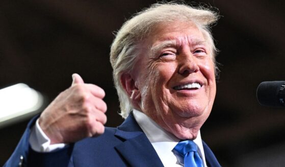 President Donald Trump speaks on stage at a campaign rally Saturday in Vandalia, Ohio.