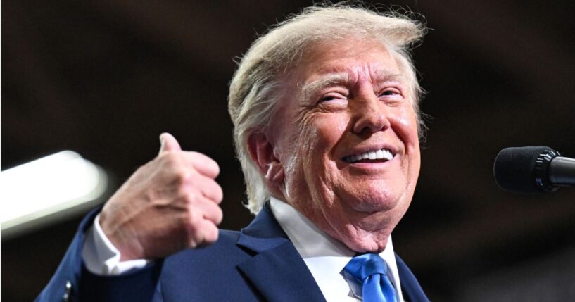 President Donald Trump speaks on stage at a campaign rally Saturday in Vandalia, Ohio.