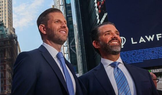 Eric Trump, left, and his brother Donald Trump Jr. are pictured in New York City's Times Square in 2025.