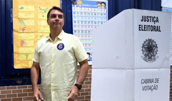 Flavio Bolsonaro, presidential candidate from the Partido Liberal, is pictured at his polling place after casting his vote Sunday during general election day in Rio de Janeiro, Brazil.