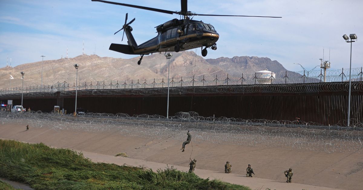 U.S. Customs and Border Protection Air and Marine Operations officers conduct a demonstration with a helicopter of their rapid response capabilities during a joint combined exercise at the border between El Paso, Texas, U.S and Ciudad Juarez, Chihuahua, Mexico, in a file photo from Aug. 13. About 500 U.S. military troops are deploying this week to the Rio Grande Valley in Texas after suspected cartel members shot at a U.S. Coast Guard vessel near Roma over the weekend.