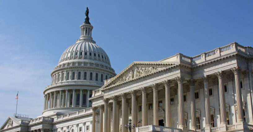 The United States Capitol stands on a sunny day in Washington, D.C.