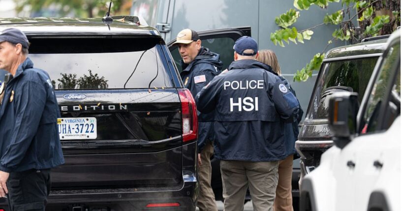 Homeland Security Investigations police search the Washington, D.C., home of Rep. Ilhan Omar, a Minnesota Democrat, Monday.