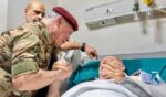 Jordan’s King Abdullah II Bin al Hussein arrives at a hospital in Karak to visit injured victims after gunmen opened fire Friday on a funeral at a church in Hammoud, Jordan