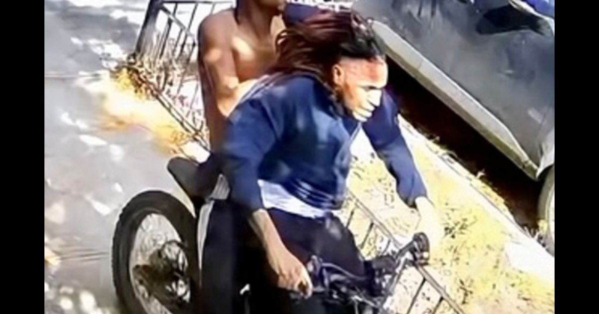 A photograph of two suspects in an Oct. 2 robbery posted by NYPD Crime Stoppers.