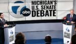 Michigan U.S. Senate candidates Democrat Abdul El-Sayed, left, and Republican Mike Rogers, right, debate Wednesday in Southfield, Michigan.