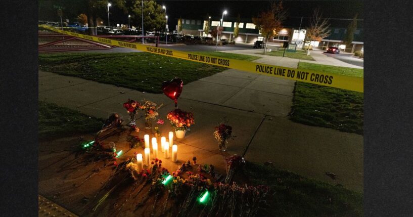Candles and flowers are seen at a makeshift memorial outside the Silver Rail Elementary School following a mass shooting Thursday in Bend, Oregon.