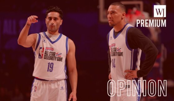 ESPN's Shams Charania, left, and Amon-Ra St. Brown are pictured at the Feb. 13 Celebrity Game during 2026 NBA All-Star at The Kia Forum in Inglewood, California.