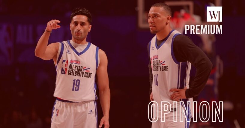 ESPN's Shams Charania, left, and Amon-Ra St. Brown are pictured at the Feb. 13 Celebrity Game during 2026 NBA All-Star at The Kia Forum in Inglewood, California.